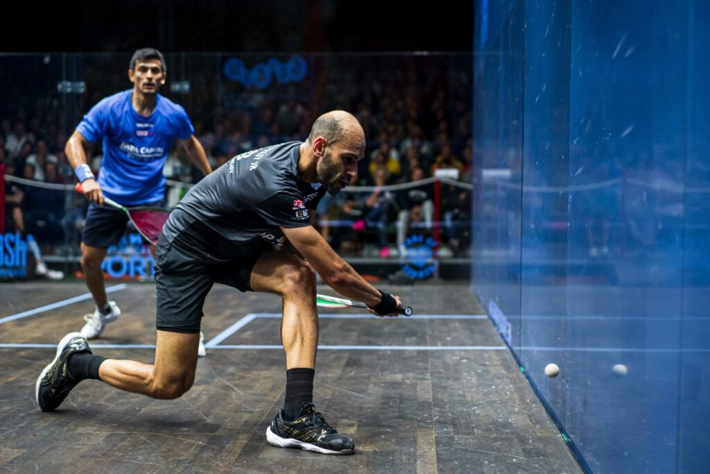 Marwan ElShorbagy on court with Saurav Ghosal