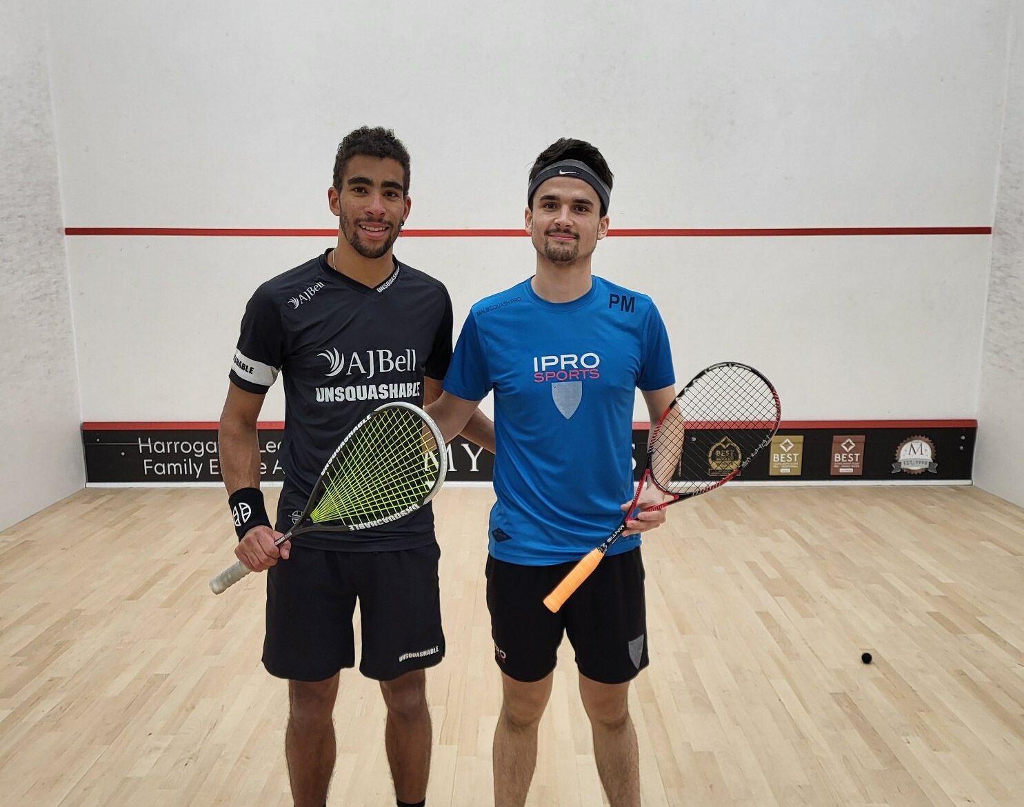 Lwamba Chileshe and Perry Malik pose for a photo prior to their semi-final clash at the Harrogate Squash Open
