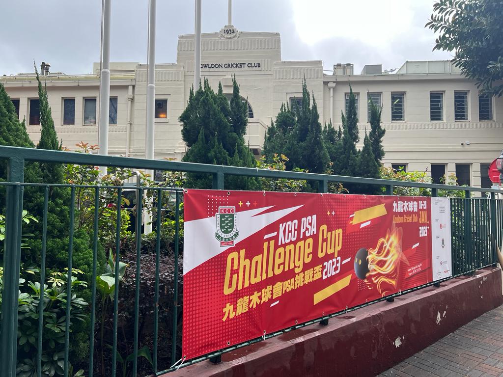 A poster for the KCC PSA Challenge Cup outside the Kowloon Cricket Club